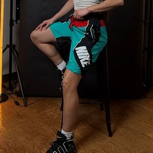 Nike Women's Turquoise and Black Athletic Shorts